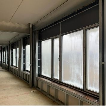 internal glass windows on a construction project being protected with Protectapeel