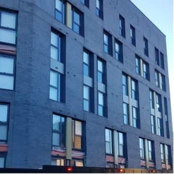 Side profile of Brass Founders construction project showing the glass and frames are undamaged due to Protectapeel protective coating