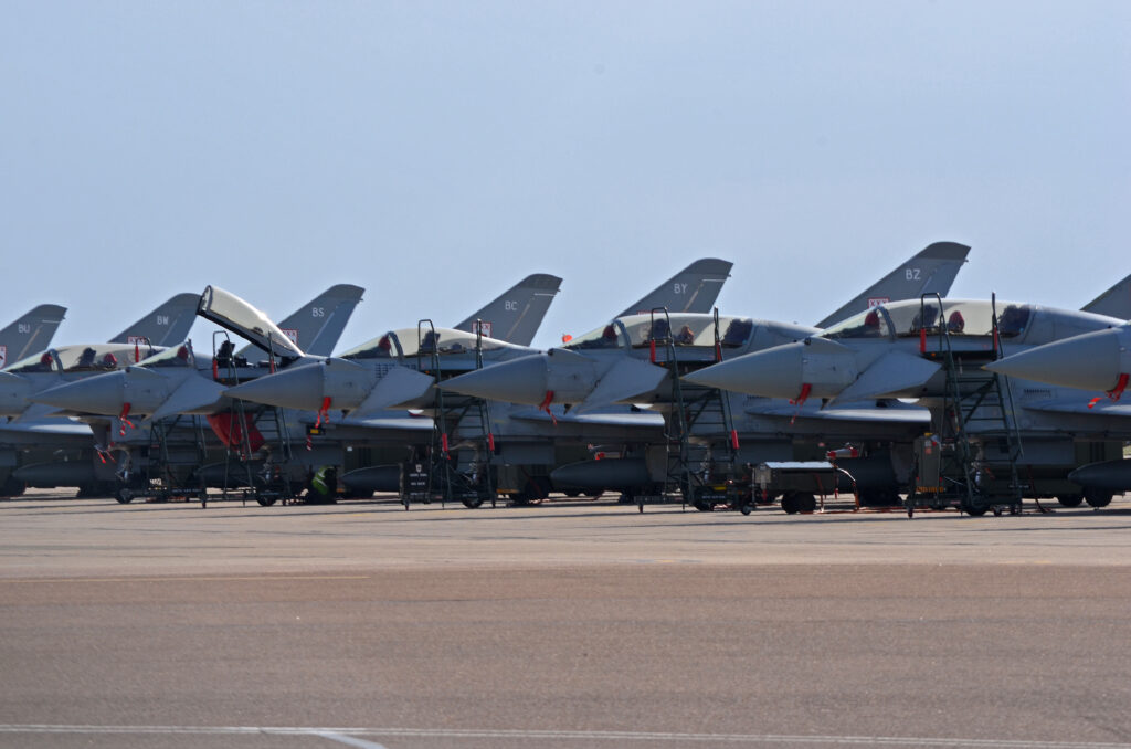 A line of stored aircraft at a military base