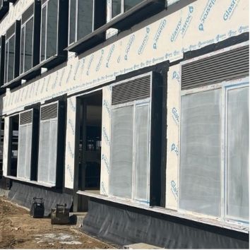 Protectapeel on the external side of glass facade on a construction site